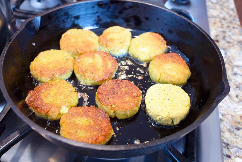 Falafel in the skillet getting a nice browning