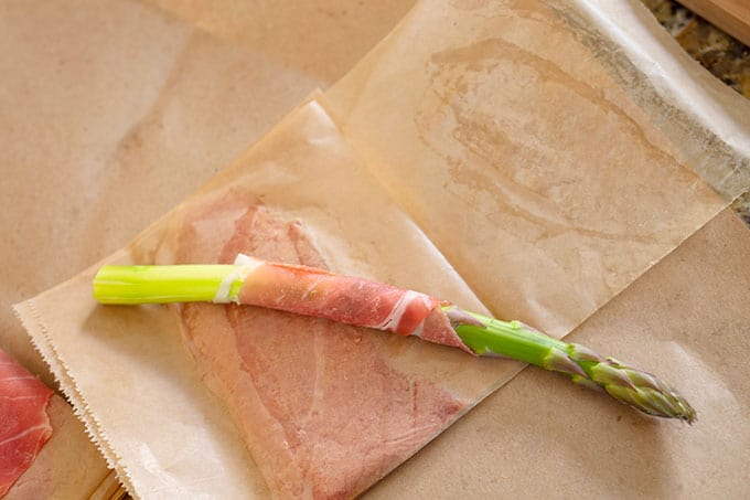 Start rolling with a "corner" of the prosciutto slice and more of it will get crispy. 