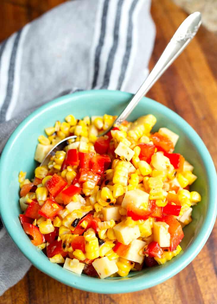 Grilled Corn Salad in a bowl with a spoon