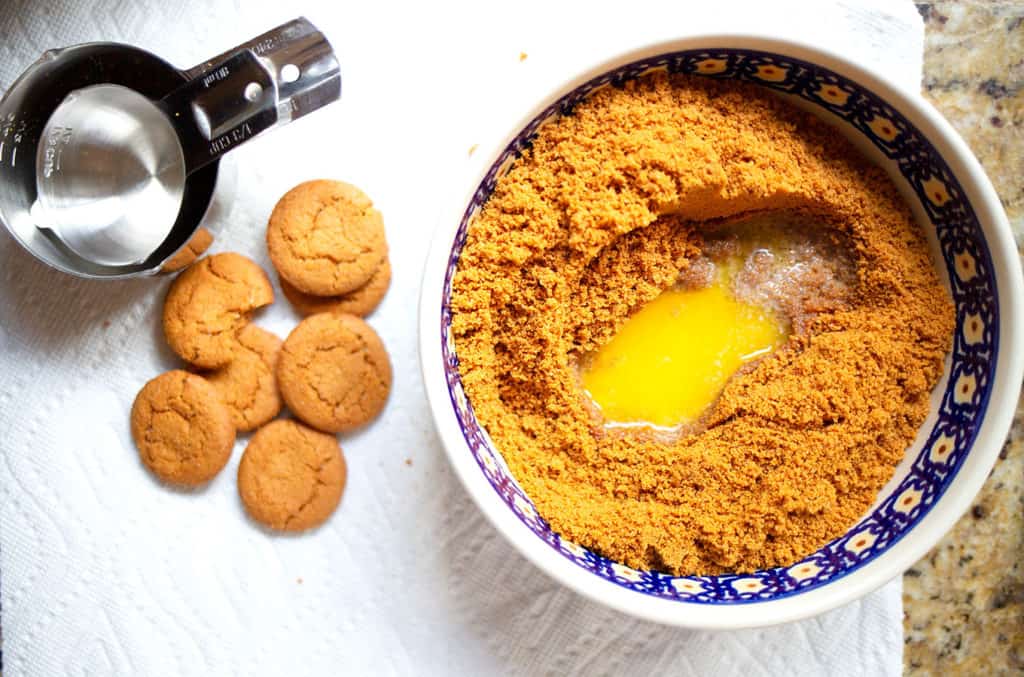Gingersnap crumbs with melted butter