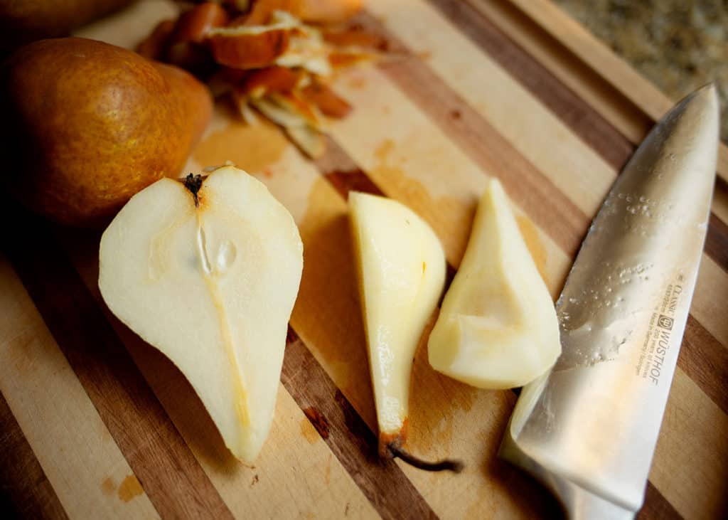 Peeled, cut, and quartered pears