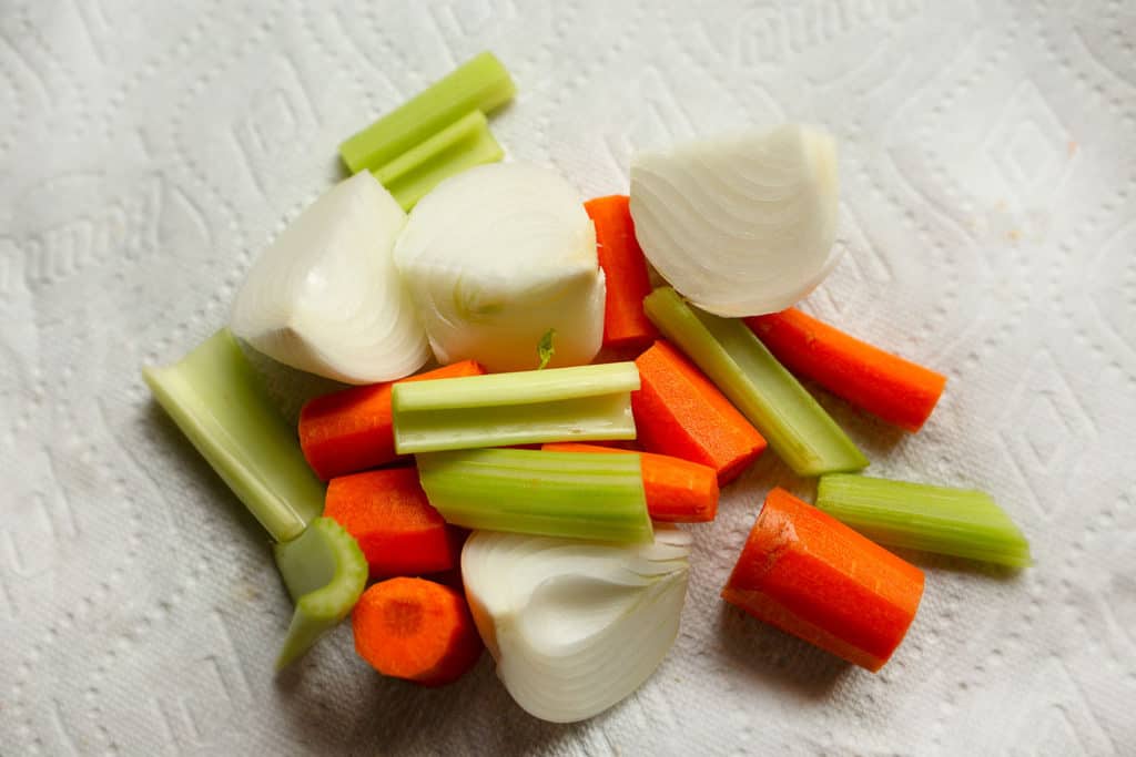 The aromatics: onion, celery, and carrot