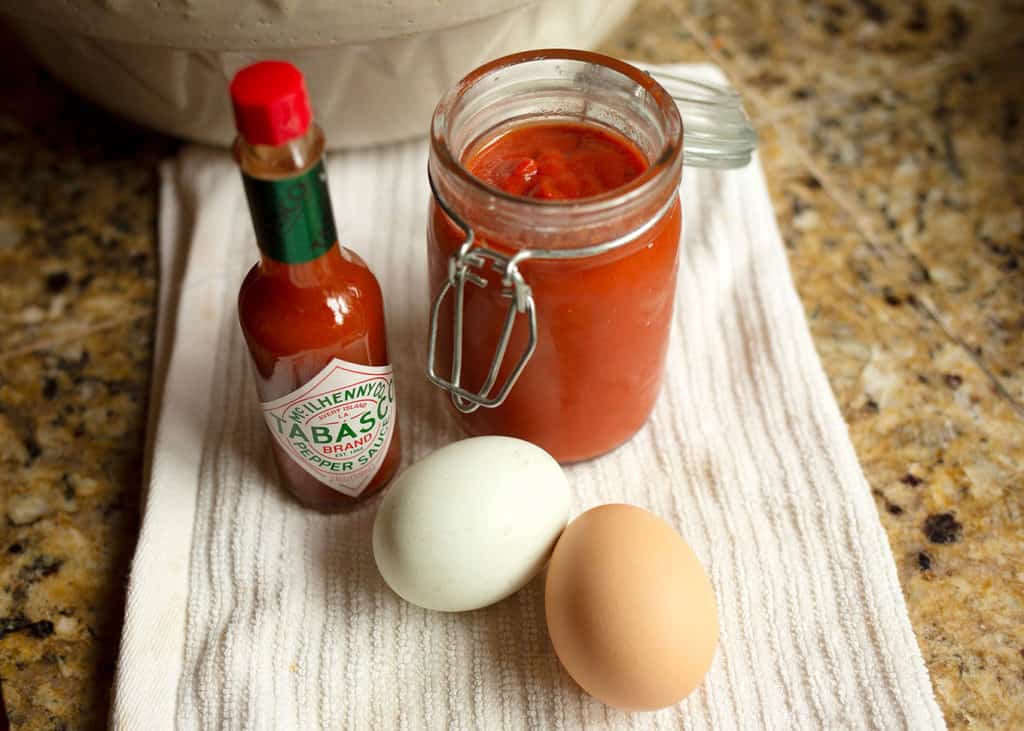 Tabasco, ketchup, eggs to be mixed in with the meat