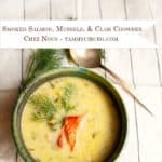 Chowder in a green pottery bowl with dill sprigs