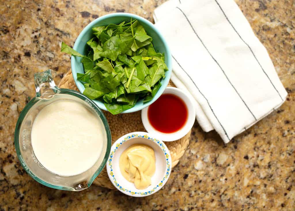 Dijon mustard, vinegar, cream, and spinach to finish the soup just before serving