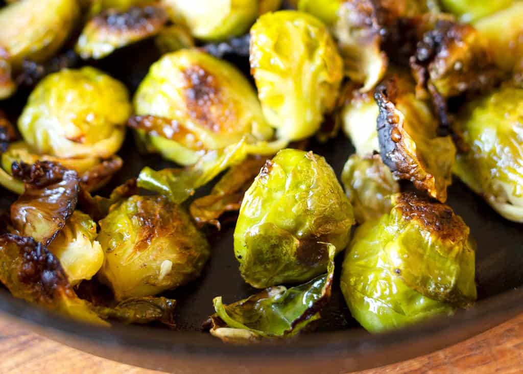 Charred Brussels Sprouts still in the skillet straight from the oven