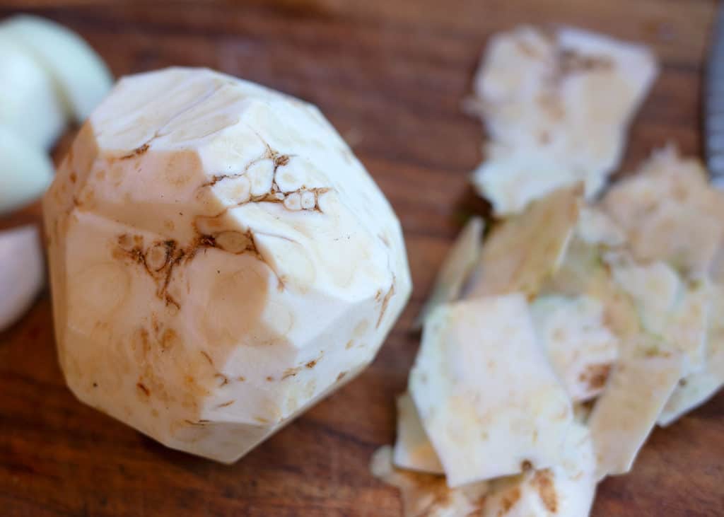 A celery root with all of the small roots cut off