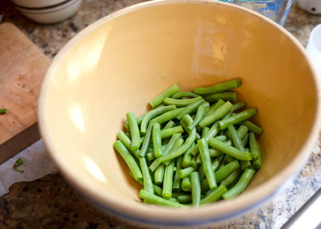 Trimmed green beans in a large bowl