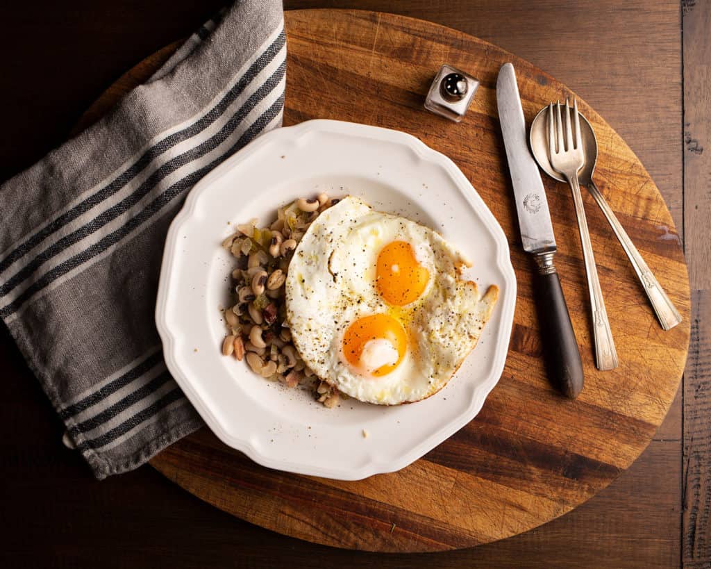 Hubby'ss preferred dish: Hoppin' John with an egg on it