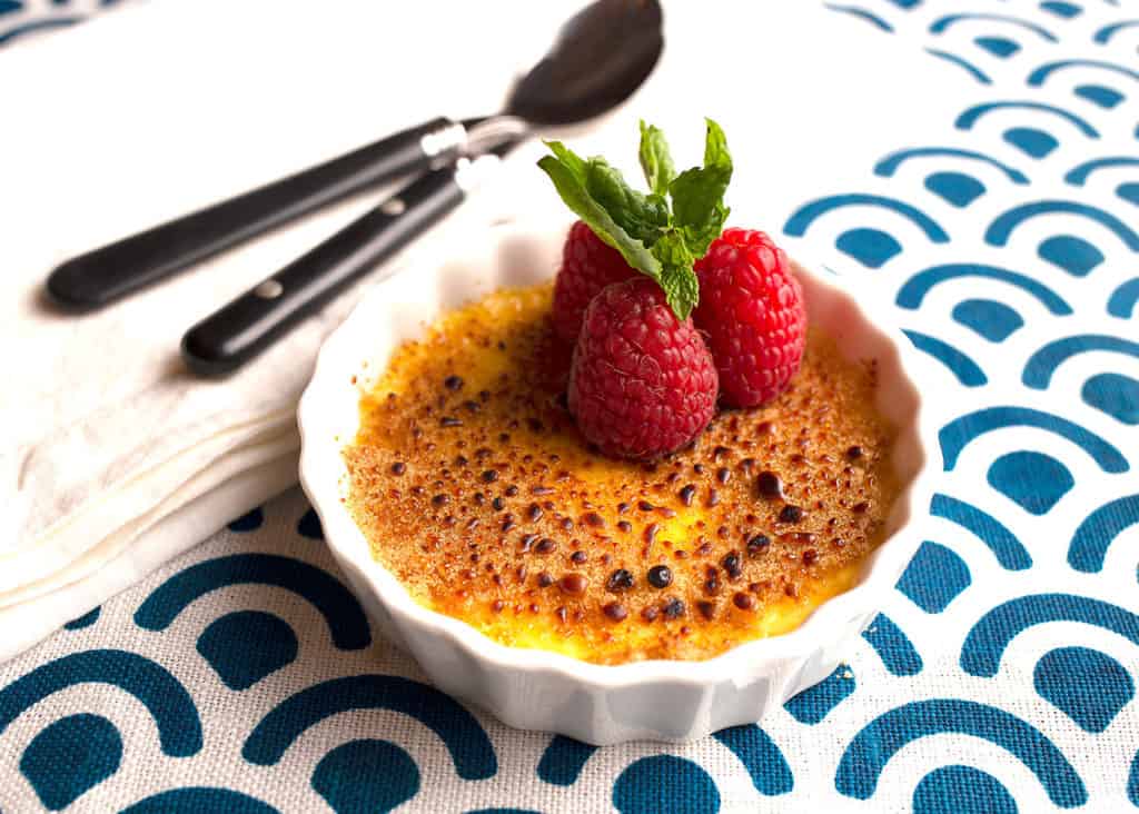 Single serving of creme brule with rasbberries