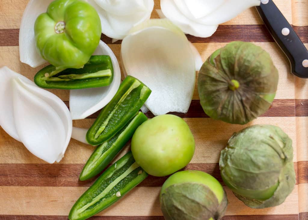 ingredients for the salsa on the cutting board