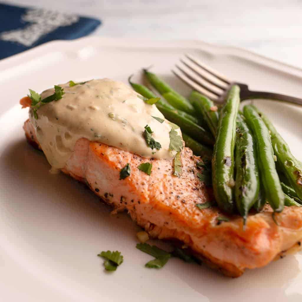 Close up of serving of salmon and green beans