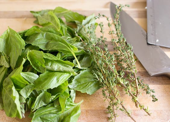 Basil and thyme to flavor the soup
