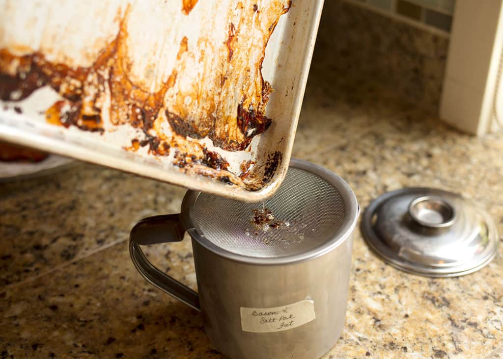 Strain the bacon fat into a stainless steel container