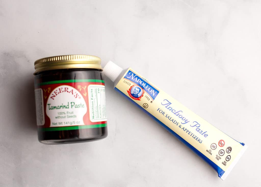 tamarind paste and anchovy paste on a counter top