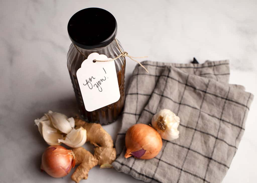 A bottle of homemade Worcestershire Sauce with a gift tag