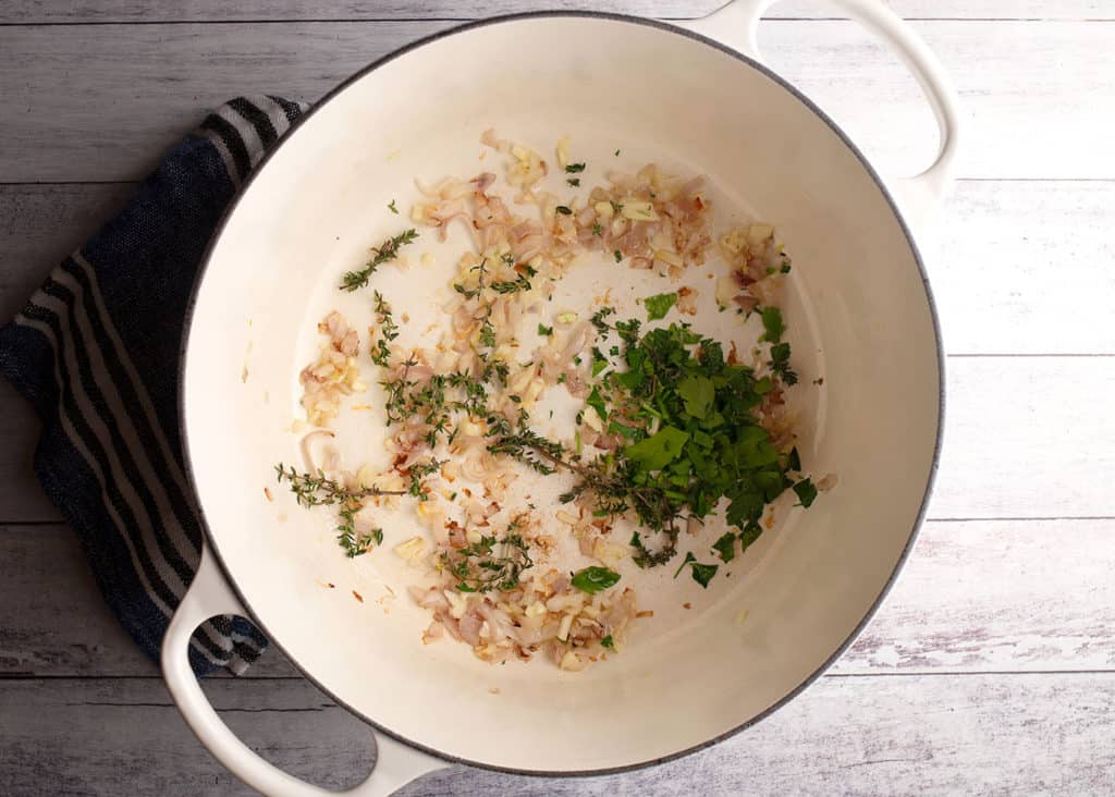 shallots, garlic, parsley, and thyme sauteed in a large Dutch oven