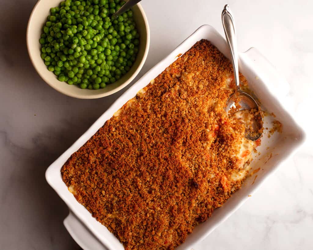 Cheesy Chicken Casserole served with green peas