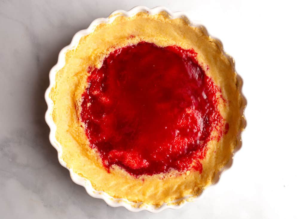 Raspberry Jelly in the bottom of the tart crust