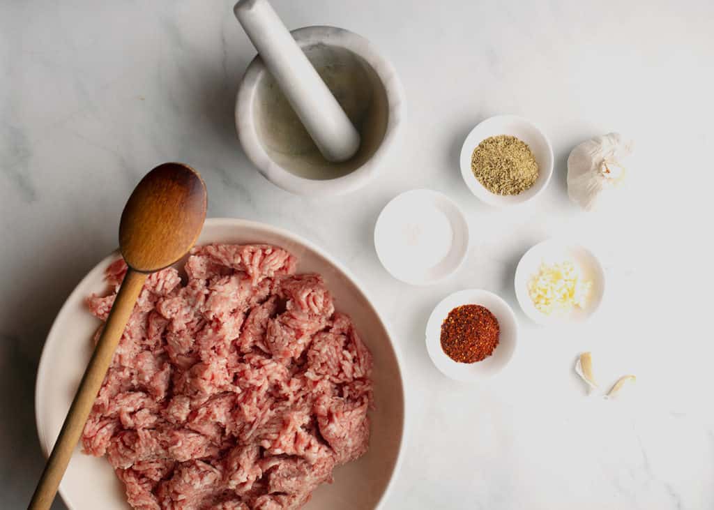 Ground pork and seasonings to make Italian sausage