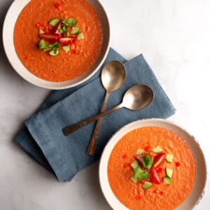 Featured Image - Two servings of Gazpacho in pottery bowls