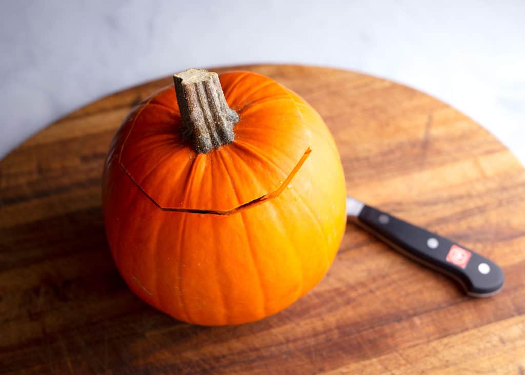 Small pumpkin with the top cut to remove