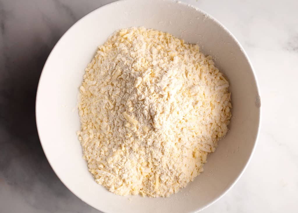Grated butter tossed with the flour mixture