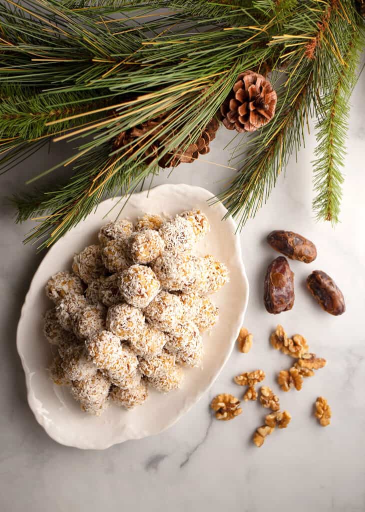 Date Nut Snowballs on a platter to serve