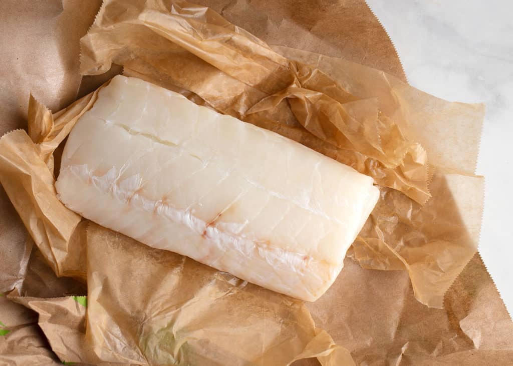Beautiful Ling cod in the fishmonger's paper