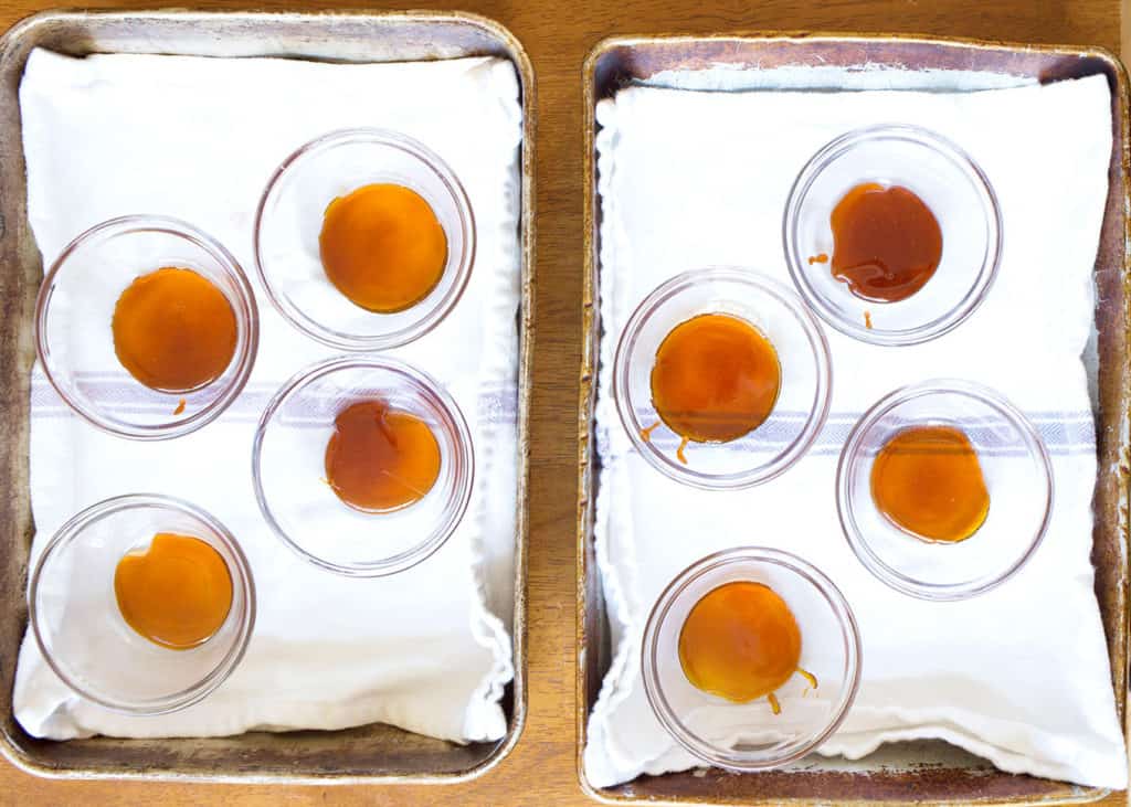 Caramel poured into the custard dishes