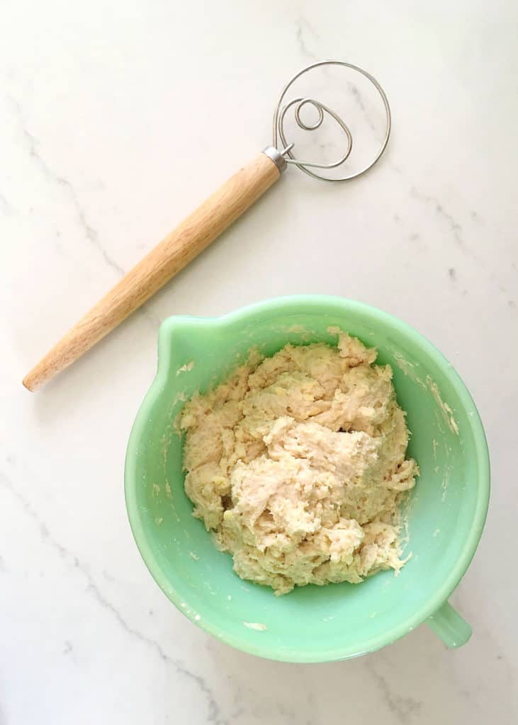 Mixing the sourdough batter with a Danish dough whisk