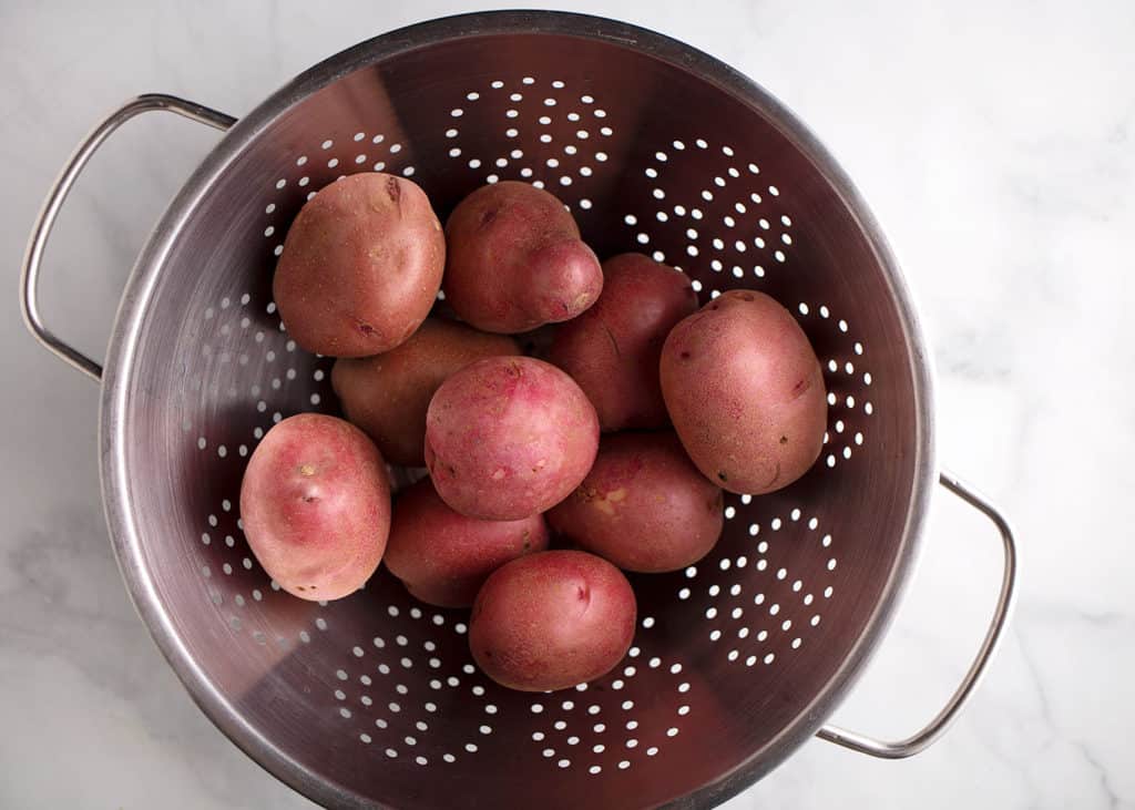 Red potatoes in a colander