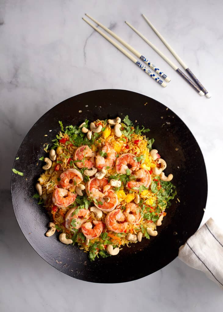 Shrimp & Pineapple Fried Rice in the wok with chopsticks