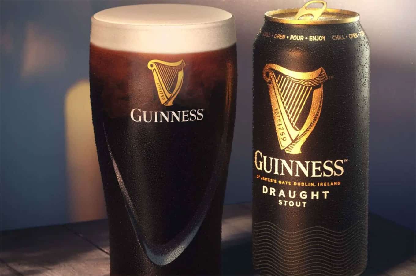 A glass of Guinness beside the can