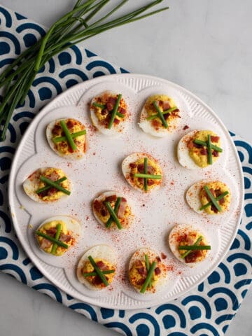 A deviled egg plate with Simple Deviled Eggs