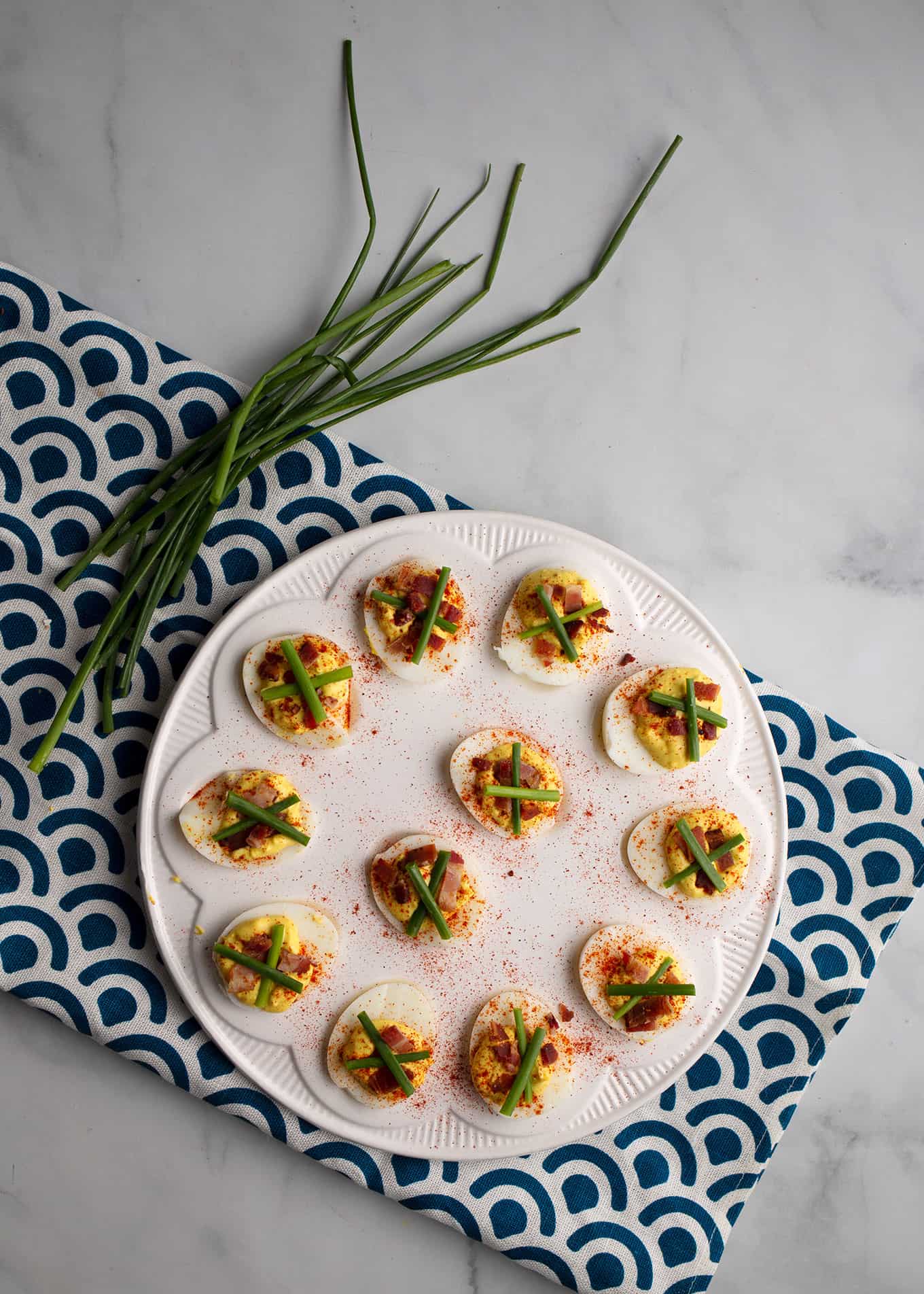 A deviled egg plate with Simple Deviled Eggs
