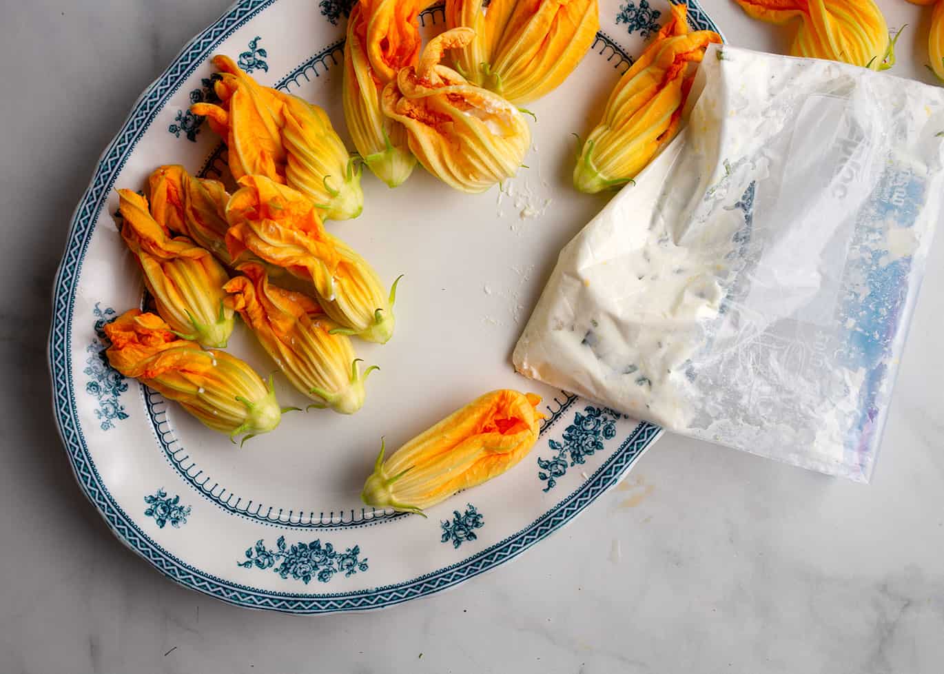 Use a ziploc bag with the corner cut off to pipe the stuffing into the flowers.
