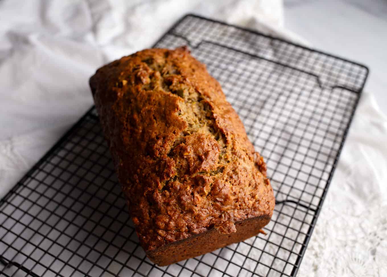 Sweet Eggplant & Pistachio Sweet Bread on a wire rack to cool