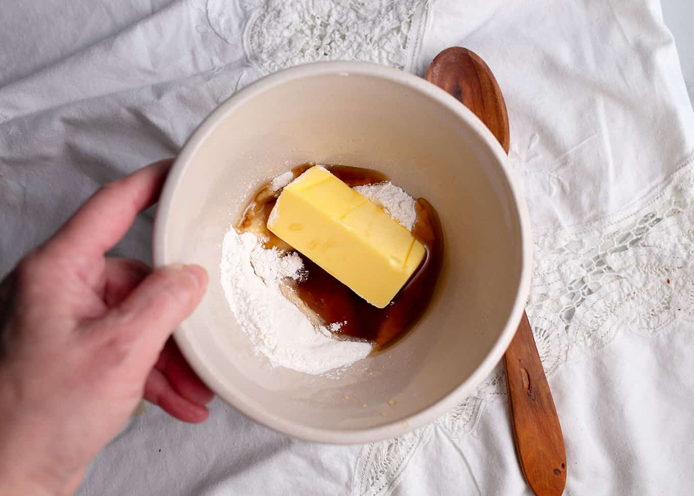 Making the frosting in a small bowl ... butter, honey, powdered sugar, and a little water.